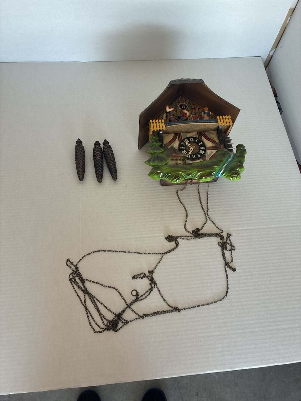Black Forest-Style Mechanical Cuckoo Clock with Woodcutters and Water Wheel